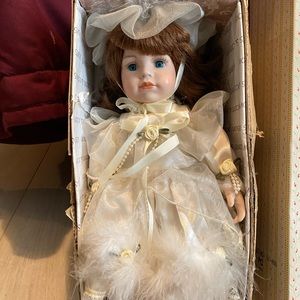 Beautiful porcelain doll in original box